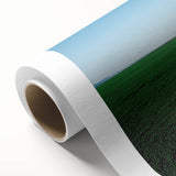 Vibrant countryside landscape rolled canvas print, showcasing lush green fields under a clear blue sky, ideal for home decor or art enthusiasts.