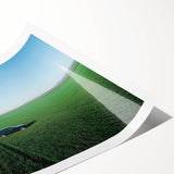 Rolling countryside landscape print in soft earth tones, showcasing rolling hills and a serene sky, ready for display or gifting.