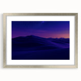 Desert landscape framed print with a silver mat, showcasing warm tones of sand and blue sky, ideal for modern home decor and art enthusiasts.