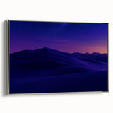 Framed canvas artwork showcasing a vibrant desert landscape with warm colors and intricate details, presented in a sleek silver frame, ideal for modern home decor.