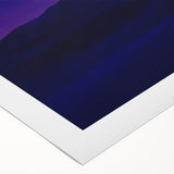 Desert landscape rolled canvas art featuring warm hues of orange and yellow, showcasing a serene sunset over sand dunes, elegantly packaged in a protective tube.