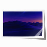 Desert landscape rolled canvas print showcasing vibrant hues of orange and yellow with intricate details, packaged securely in a protective cardboard tube for safe delivery.