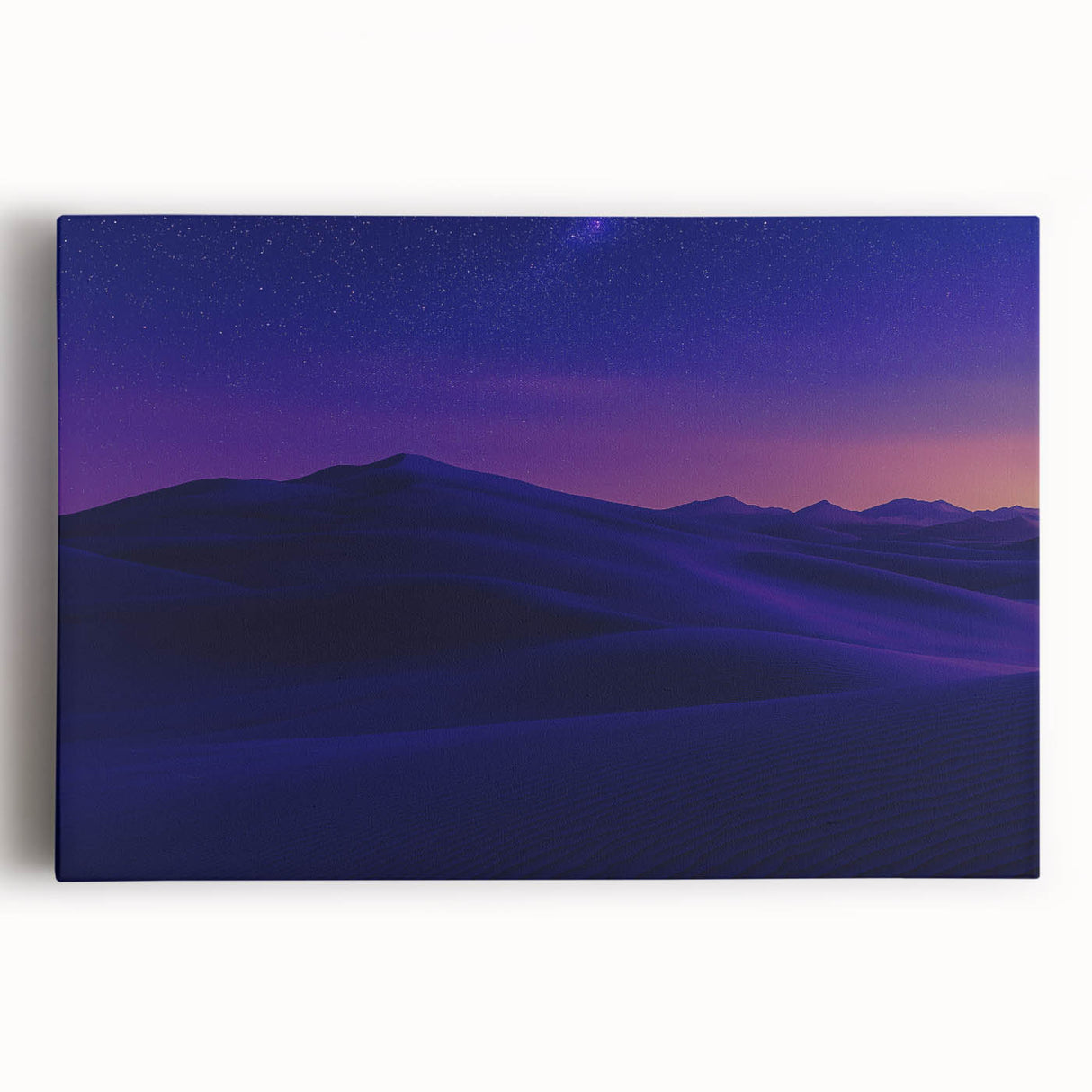 Stretched canvas artwork depicting a vibrant desert landscape, showcasing warm hues of orange and yellow with intricate details of cacti and mountains, perfect for enhancing home decor.