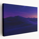 Desert landscape stretched canvas artwork showcasing vibrant hues of orange and yellow, depicting a serene sunset over sandy dunes, ideal for home decor.