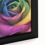 Close-up of a black framed canvas featuring a textured floral design with vibrant colors, ideal for living room decor.