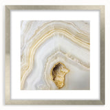 Textured abstract art print featuring earthy brown and green hues on a silver-framed canvas, suitable for bedroom decor.