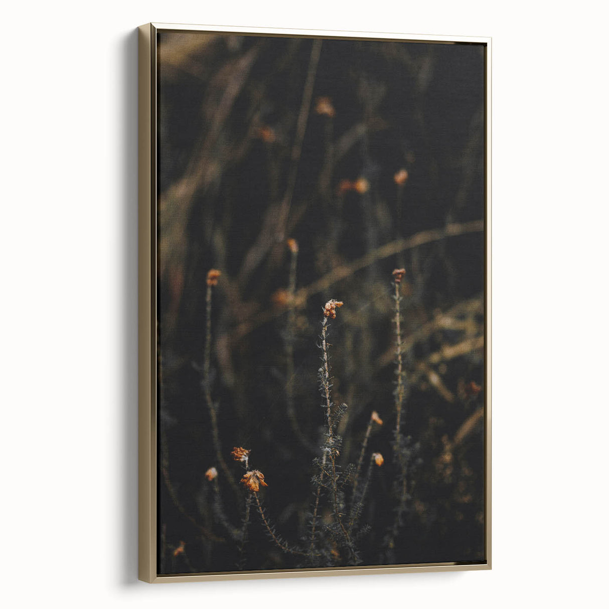 Framed canvas depicting a vintage-style landscape with autumnal trees in gold and black tones, ideal for bedroom wall decor.