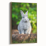 Framed canvas featuring a vintage landscape painting with spring themes in muted greens and browns.