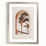 Textured abstract art print in cool blue and gray shades, framed in silver, ideal for bedroom decor.