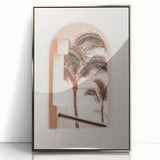 Mid-century modernist art featuring geometric shapes in muted pastel colors on silver-framed acrylic.