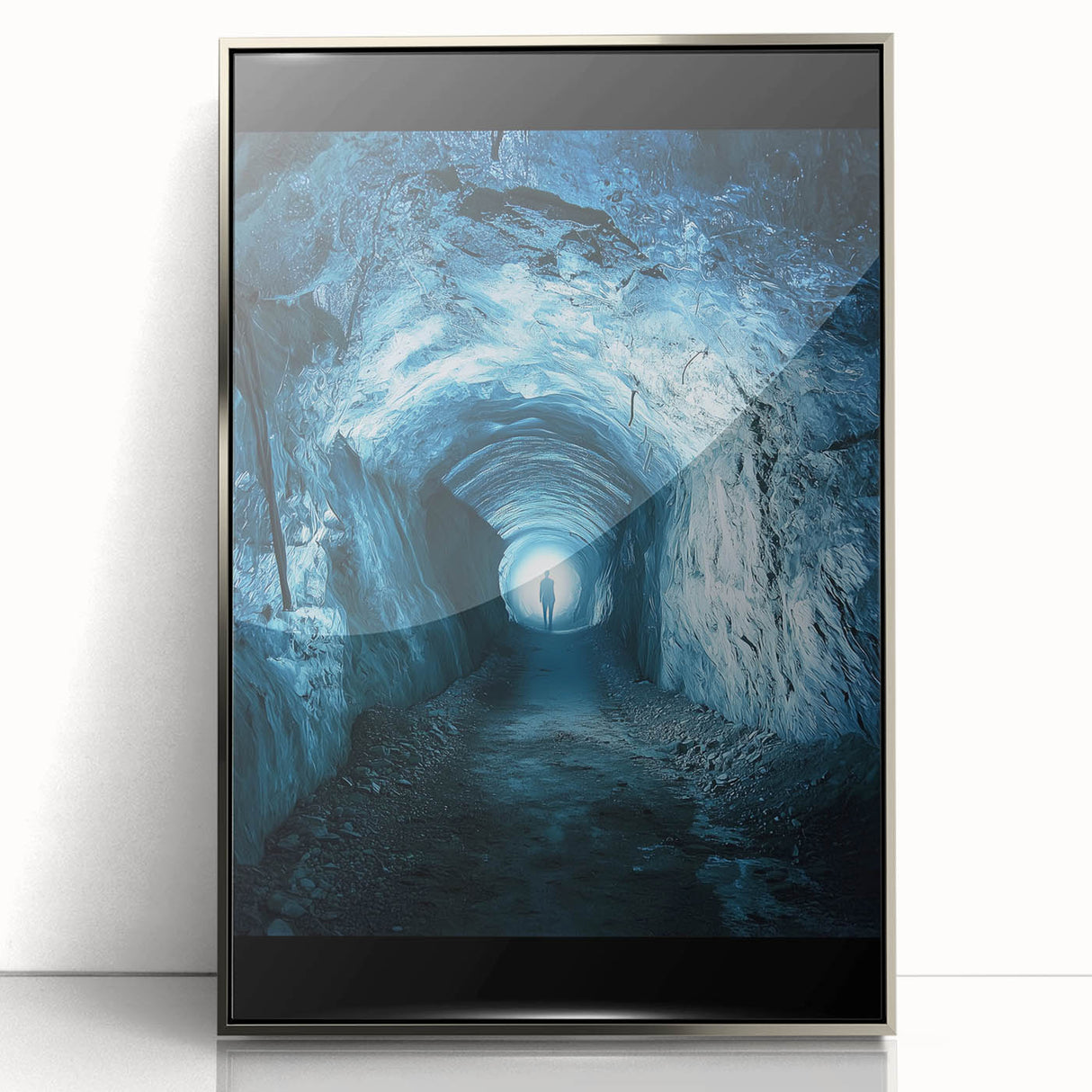 Framed acrylic artwork depicting a stunning landscape with intricate cave formations, featuring a sleek silver frame that enhances the vibrant colors and details.