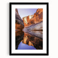 Framed black landscape art print showcasing dramatic cliffs, designed with a sleek mat for an elegant presentation, perfect for modern home decor.