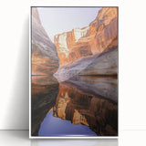 Framed acrylic artwork showcasing a vibrant landscape of majestic cliffs against a clear blue sky, designed to enhance interior decor with its striking colors and depth.