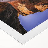 Vibrant rolled canvas artwork depicting a stunning landscape with dramatic cliffs and lush greenery, perfect for enhancing home decor. Packaged securely in a durable cardboard tube for safe delivery.