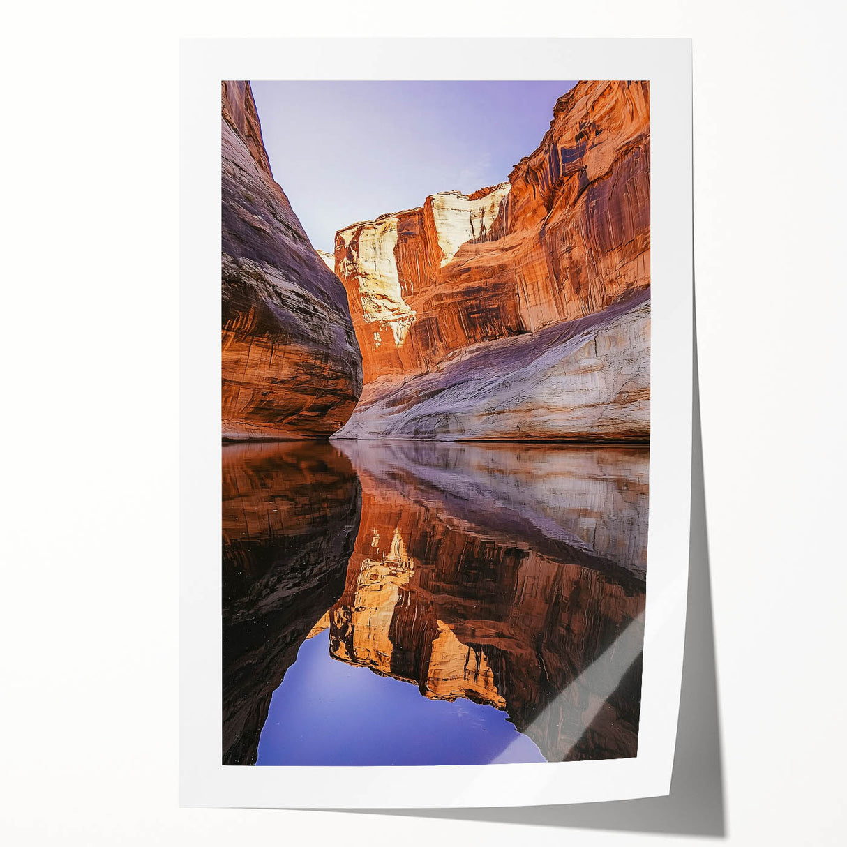 Stunning landscape print showcasing dramatic cliffs against a vibrant sunset, rolled and packaged in a protective tube, ideal for home decor enthusiasts.