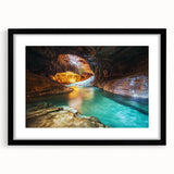 Landscape art print of canyons framed with a black mat, showcasing vibrant colors and intricate textures, ideal for enhancing modern home decor.