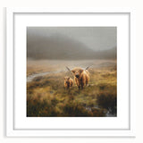 Landscape wall art framed in white, showcasing a serene countryside scene with rolling hills and a clear blue sky, perfect for home decor.