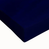 Close-up of a stretched canvas showcasing a vibrant desert landscape with warm tones of orange and gold, capturing the essence of the arid environment and textured details.