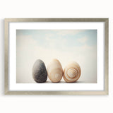 Textured art print featuring abstract nature elements in muted earth tones, framed in silver, ideal for bedroom decor.