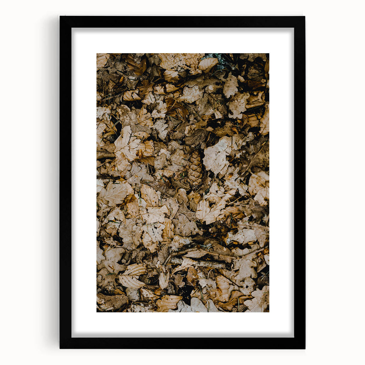 Extra large abstract art print featuring textured, colorful fall foliage, framed in black, ideal for living room decor.