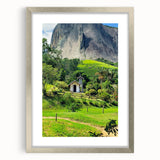 Textured abstract art print in soft blue and green tones, framed in silver, ideal for bedroom ambiance.