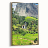 Framed canvas depicting a vintage-style landscape with muted greens and browns, ideal for bedroom wall art.