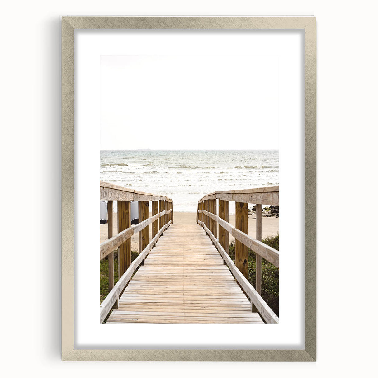 Textured abstract art print in neutral and blue tones, framed in silver, ideal for bedroom art.