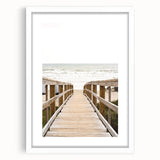 Abstract art print featuring swirling summer hues in pastel, framed in white, ideal for bedroom or dining room decor.