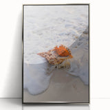 Mid-century modernist art depicting geometric shapes in muted pastel tones on a silver-framed acrylic print.