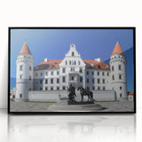Framed acrylic print showcasing a stunning landscape of a majestic castle, featuring a sleek black frame that enhances the artwork, perfect for home decor enthusiasts.
