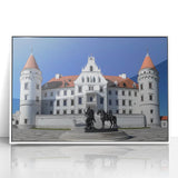 Framed acrylic artwork depicting a serene landscape with a castle, featuring vibrant colors and intricate details, set in a sleek white frame, ideal for home decor.