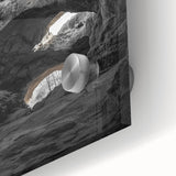 Close-up of an acrylic glass artwork showcasing vibrant landscapes and intricate cave designs, emphasizing texture and depth for a striking visual impact.