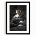 Framed landscape artwork depicting a serene cave scene, featuring a black mat and sleek frame, perfect for home decor and nature enthusiasts.