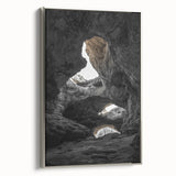 Framed canvas artwork depicting a serene landscape with caves, showcasing intricate textures and a silver frame, ideal for modern home decor.