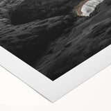 Rolled canvas showcasing a stunning landscape artwork of caves, featuring intricate details and vibrant colors, neatly packaged in a protective cardboard tube for delivery.