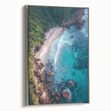 Framed canvas artwork showcasing a stunning landscape of rugged cliffs with vibrant colors, displaying a silver frame that enhances its modern aesthetic, perfect for home decor.