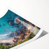 Vibrant landscape print showcasing dramatic cliffs against a serene sky, rolled for easy transport, perfect for enhancing home decor with natural beauty.