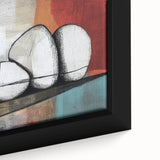 Close-up of an abstract geometric wall art canvas featuring bold colors and intricate patterns, framed elegantly, ideal for modern home decor.