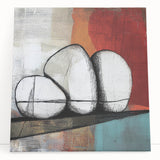 Abstract geometric stretched canvas artwork showcasing vibrant colors and intricate shapes, leaning against a neutral wall, perfect for modern home decor.