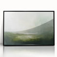 Framed acrylic wall art showcasing an abstract landscape design in muted tones of blue and green, with a sleek black frame, ideal for modern home decor.