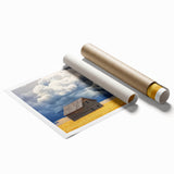 Landscape barn print on rolled canvas showcasing vibrant colors and detailed textures, ideal for home decor; securely packaged in a protective cardboard tube.