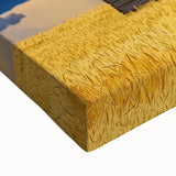 Close-up of a stretched canvas print showcasing a vibrant barn landscape design with rich colors, ideal for rustic home decor and art enthusiasts.