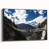 Framed canvas artwork showcasing a serene landscape bridge in a black frame, highlighting natural beauty with lush greenery and tranquil waters, ideal for home decor.
