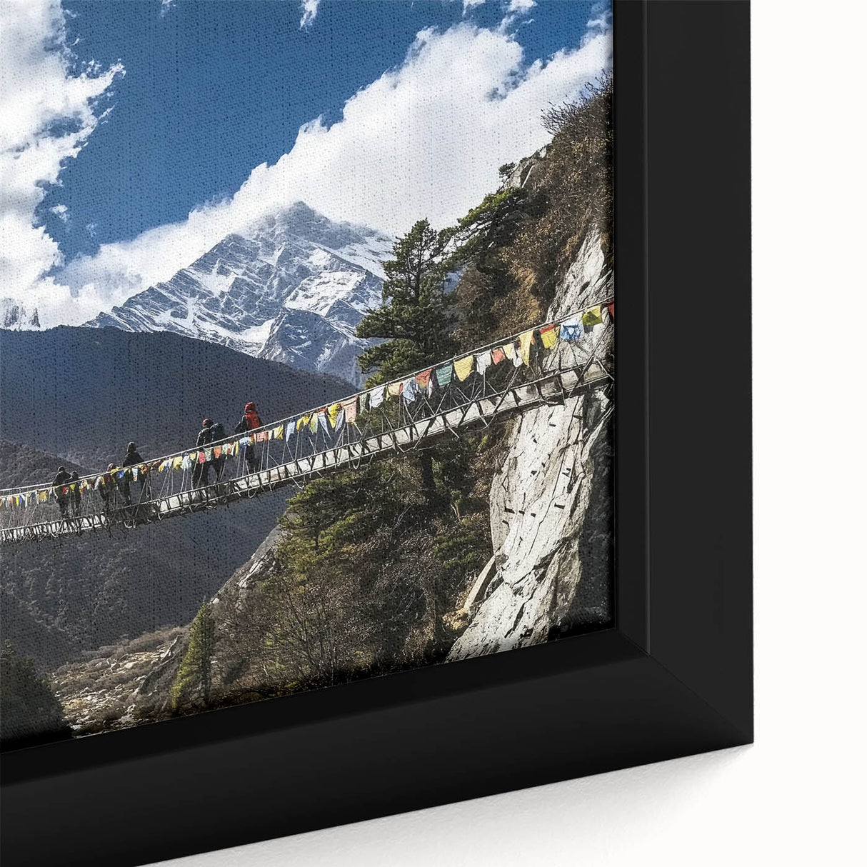 Close-up of a framed landscape canvas print showcasing a serene bridge over a tranquil river, featuring vibrant colors and intricate details, perfect for home decor.