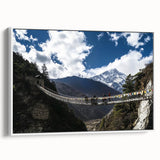 Framed canvas artwork depicting a serene landscape bridge under a blue sky, showcasing vibrant colors and fine details, ideal for enhancing home decor.