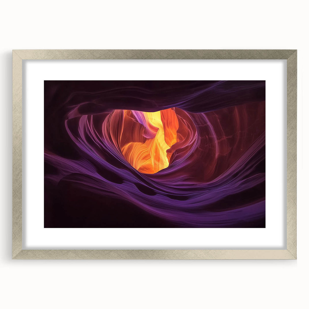 Framed landscape artwork depicting vibrant canyons in shades of orange and brown, with a sleek silver mat, perfect for enhancing modern home décor.