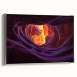 Framed canvas artwork showcasing a stunning landscape of canyons, featuring vibrant colors and intricate details, displayed with a sleek silver frame, ideal for home decor.