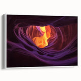Framed canvas artwork depicting a stunning landscape of canyons with vibrant colors, showcasing intricate details and a white border, ideal for home decor.