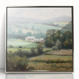 Framed acrylic wall art showcasing a serene countryside landscape, featuring lush green fields, a clear blue sky, and a silver frame for an elegant touch.