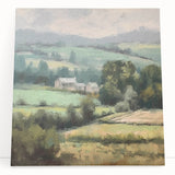 Stretched canvas wall art depicting a serene countryside landscape, showcasing rolling hills and a vibrant sunset. Perfect for adding warmth and tranquility to home decor.